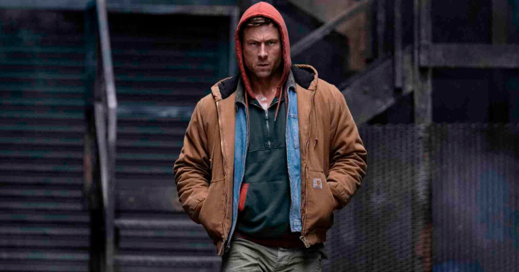Glen Powell em O Sobrevivente (Foto: Reprodução)